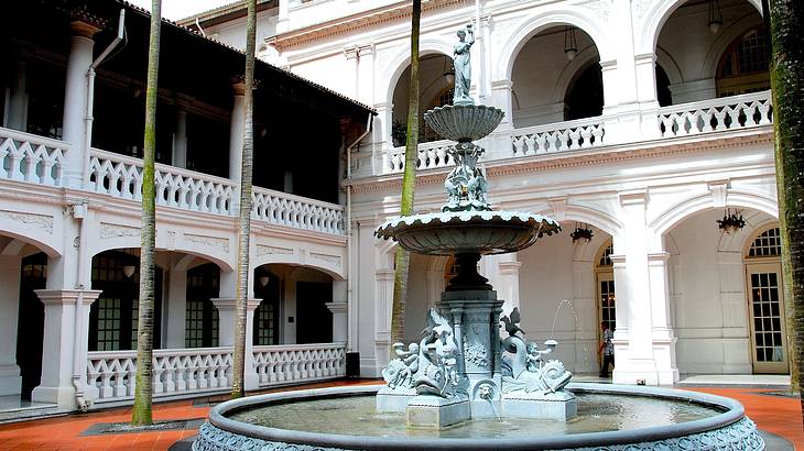 A fountain in a courtyard of Raffles Hotel in Singapore