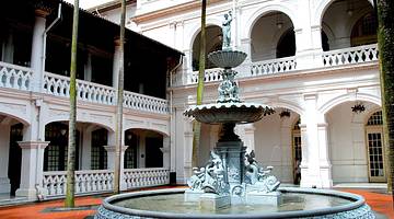 A fountain in a courtyard of Raffles Hotel in Singapore