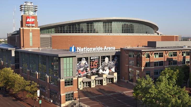 An arena with a "Nationwide Arena" sign and ice hockey banners