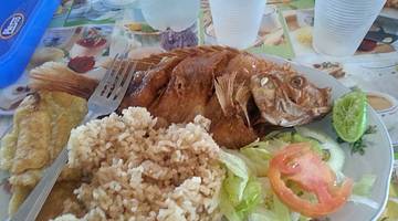 Typical fish plate with carbs and salad in Cartagena