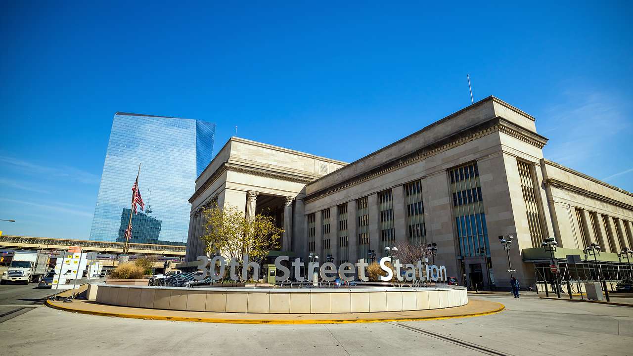 A building with a sign that says "30th Street Station"