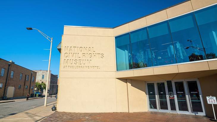 A museum building with a sign that says "National Civil Rights Museum"