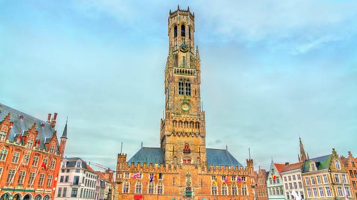 A building with a medieval bell tower on a sunny day