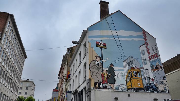 Comic strip murals on buildings are famous landmarks in Belgium