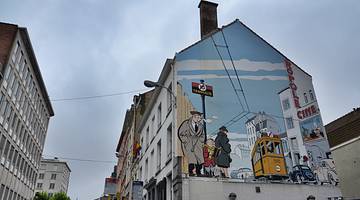Comic strip murals on buildings are famous landmarks in Belgium