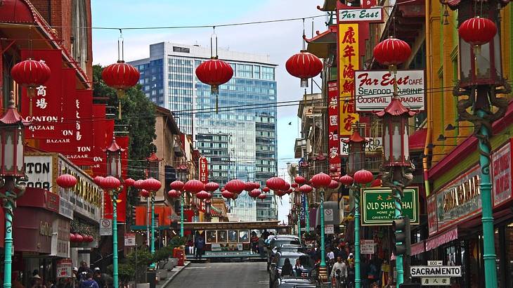 A street with lanterns hanging and Asia-inspired shops