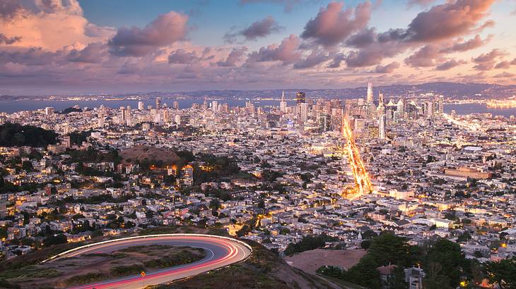 A lookout across a city as the sun sets