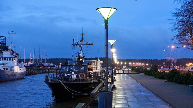 Ship in Klaipeda harbour at night, Lithuania