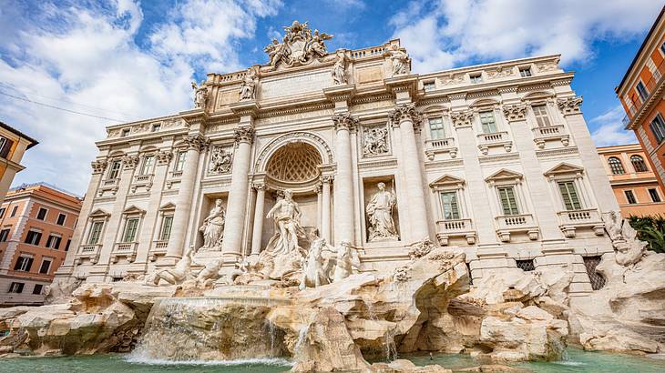 Trevi Fountain's water cascading under its magnificent structure
