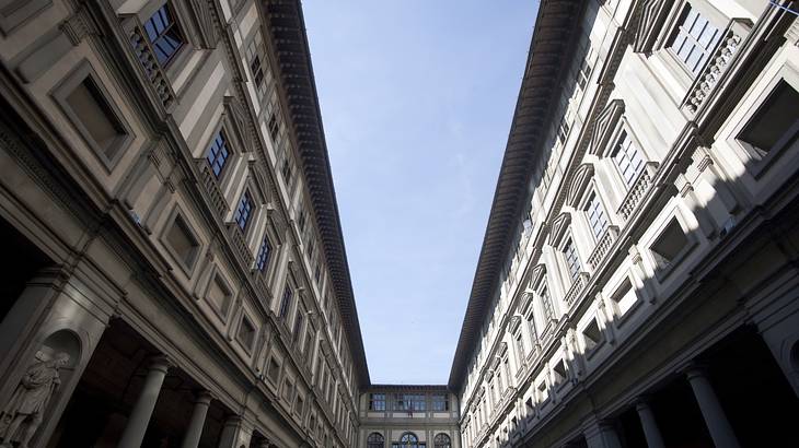 A wide-angle shot of the interior courtyard of the Uffizi Gallery in Florence A wide-angle shot of the interior courtyard of the Uffizi Gallery in Florence