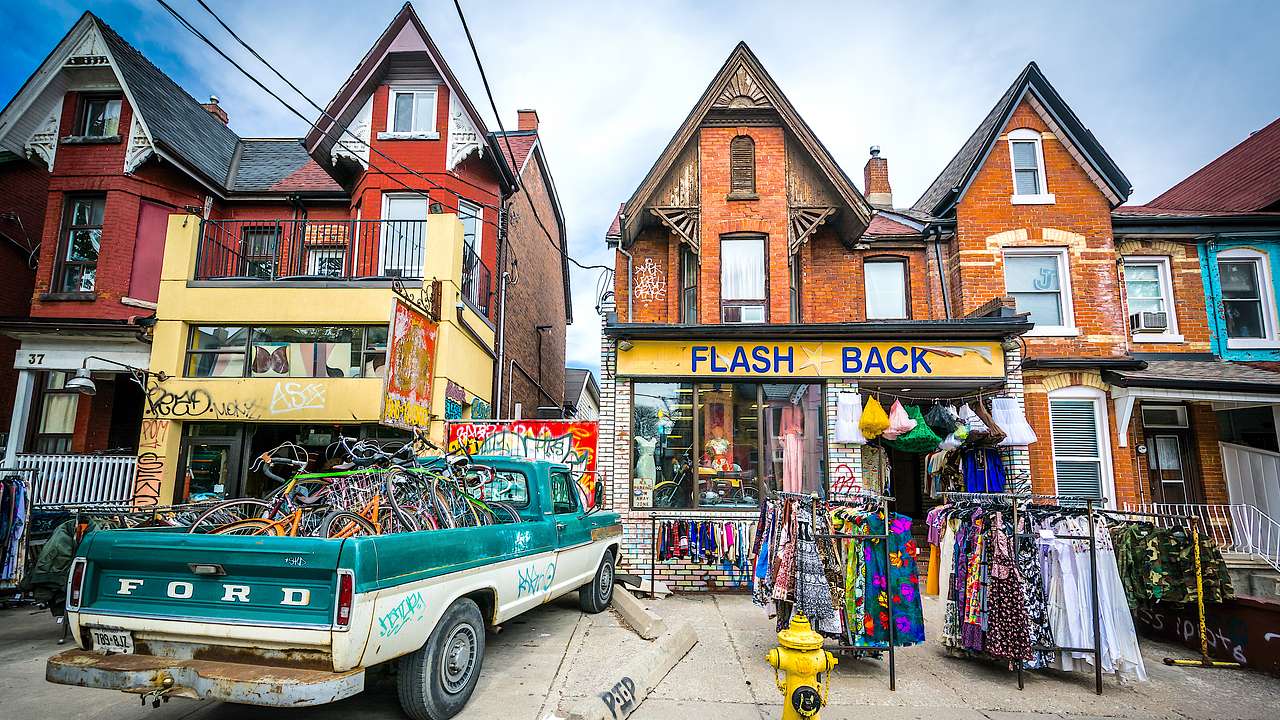 Shops on a Toronto street with a variety of merchandise, Toronto, Ontario, Canada