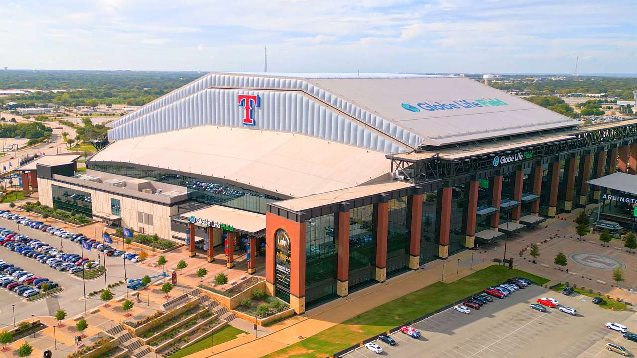 An arena that says "Globe Life Field" on the side with a red "T" on the front