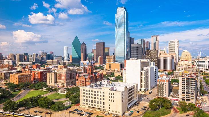 A city skyline under a blue sky