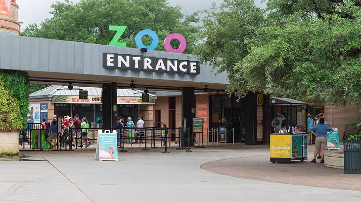 An entrance with a sign saying "Zoo Entrance"
