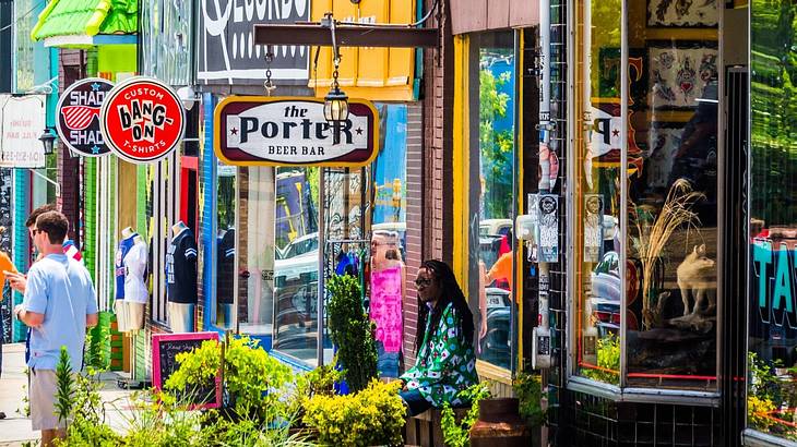 A street with colorful buildings and store signs