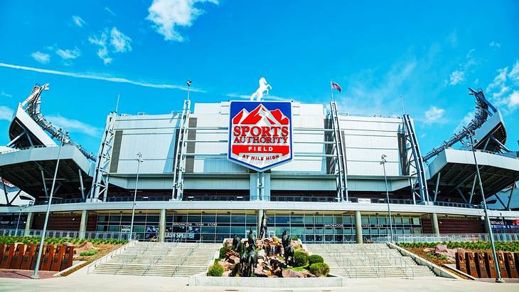 A sports arena with a "Sports Authority Arena" sign on the front A sports arena with a "Sports Authority Arena" sign on the front