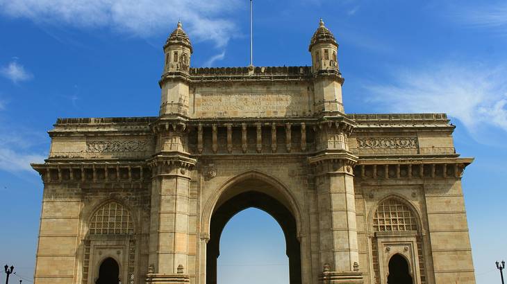 A monumental gate standing against blue sky