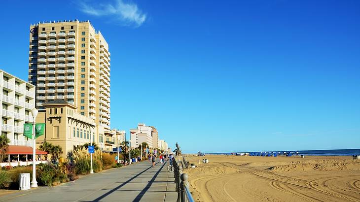 Buildings and a paved walkway by the beach