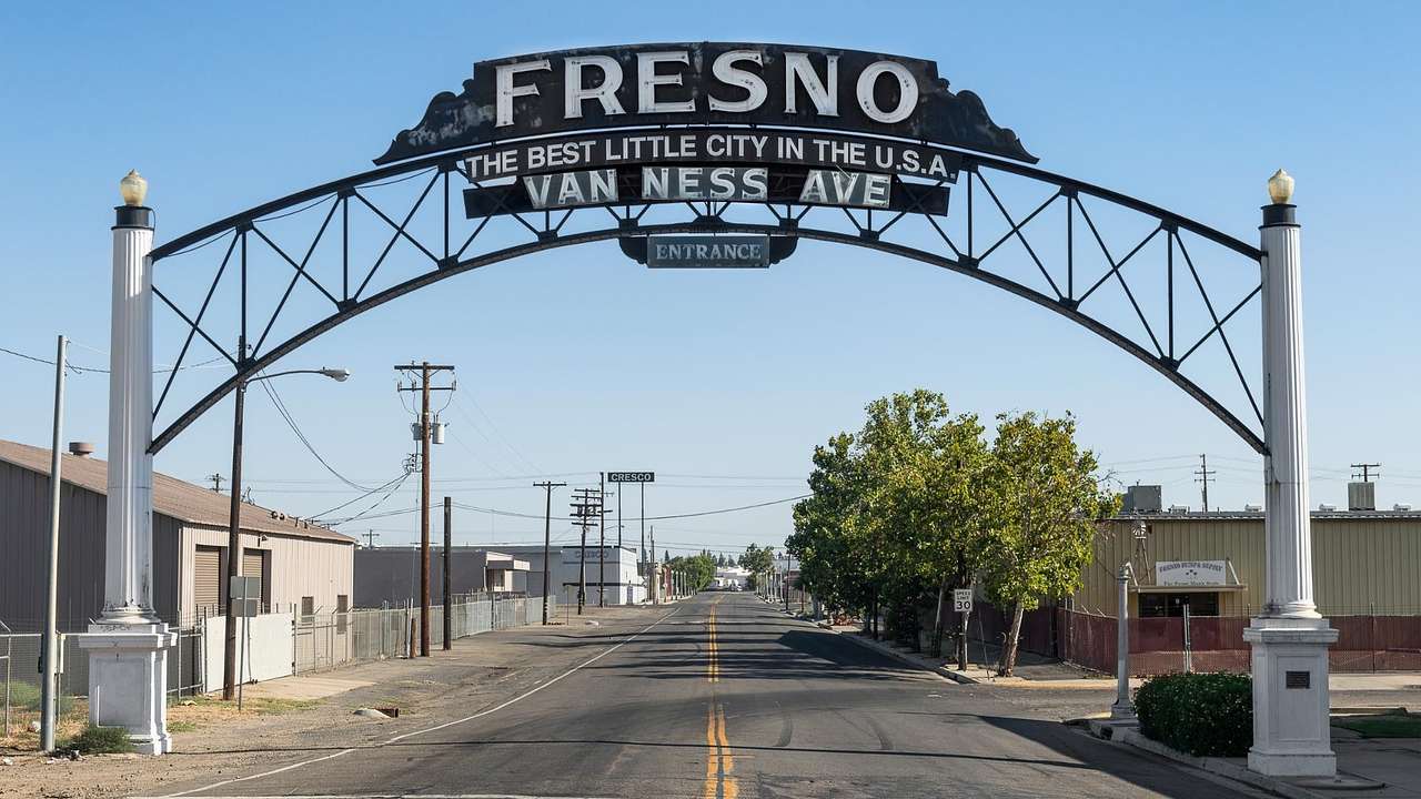 A sign that says "Fresno, Best Little City in the USA, Van Ness Ave"