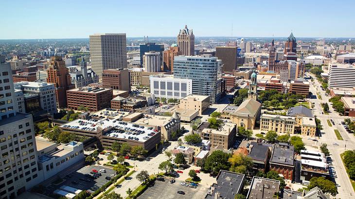 Aerial shot of city buildings and roads on a sunny day Aerial shot of city buildings and roads on a sunny day
