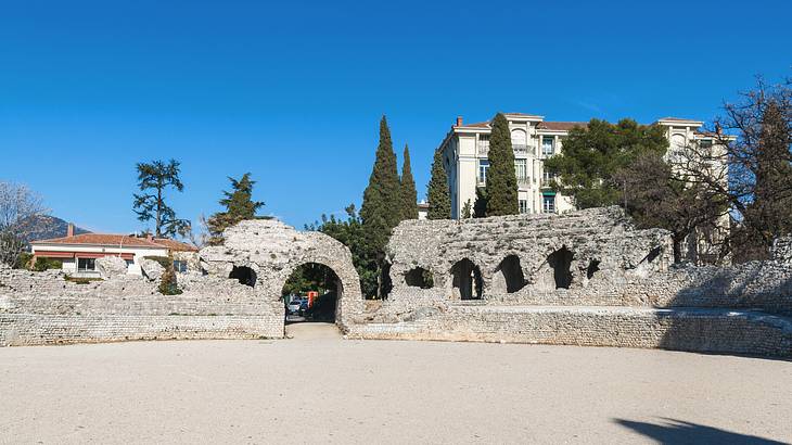 A view of old Roman ruins in a park in Nice, France A view of old Roman ruins in a park in Nice, France