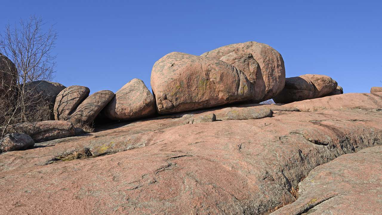 Huge granite stones on a ridge under a clear blue sky