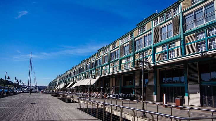 A long building near a wide plank walkway