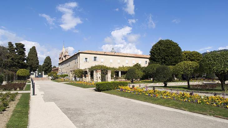 A building near a garden and a road