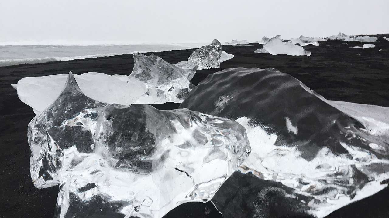 Glacier chunks on a black sand beach