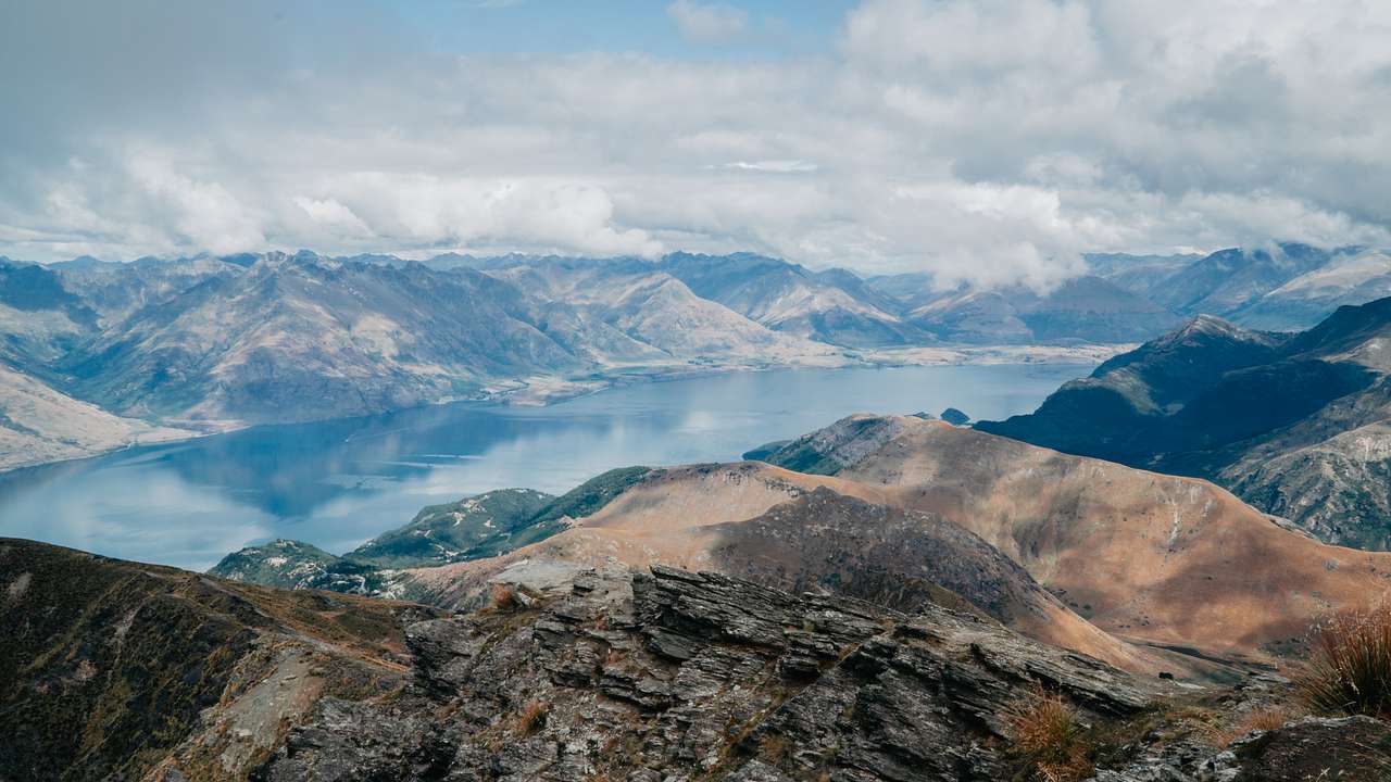 Panorama view of mountains and a lake from Ben Lomond's Summit, New Zealand