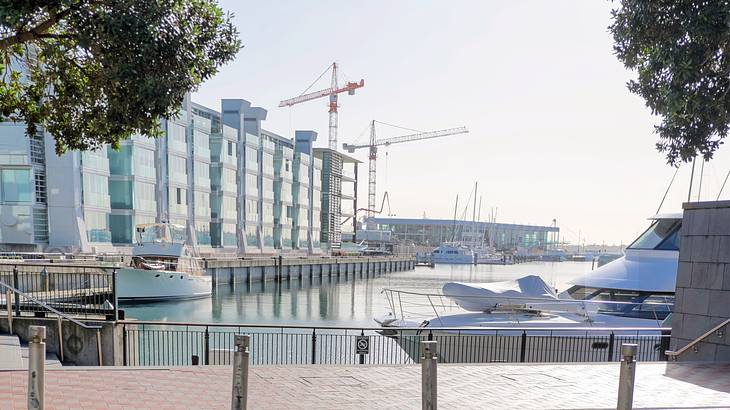 A port with a modern building and yachts moored