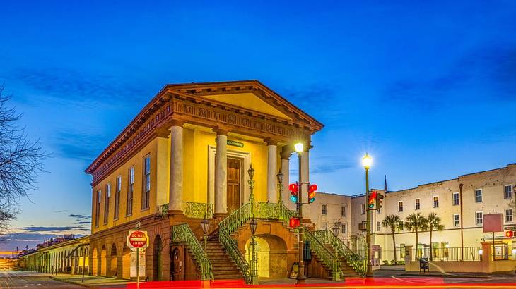 A Greek-inspired structure with four columns and two flights of stairs