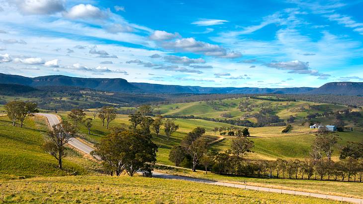 View of green grassy hills and trees, Oberon, Central Tablelands, NSW, Australia