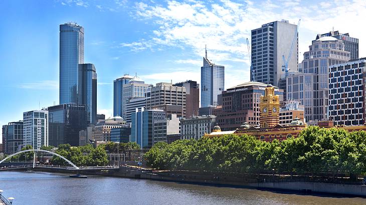 Melbourne CBD skyline along water, Victoria, Australia