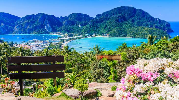 A view from a hilltop garden of the ocean and greenery-covered hills