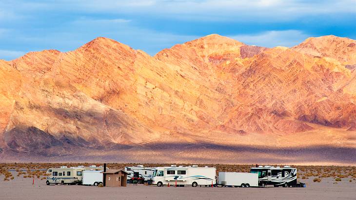 Trailers and RVs with mountain ranges in the background