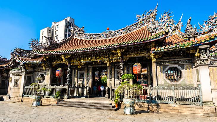 The outside of a colourful temple in Taipei, Taiwan