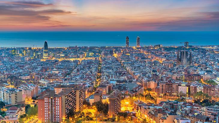 An aerial shot of an urban city at night