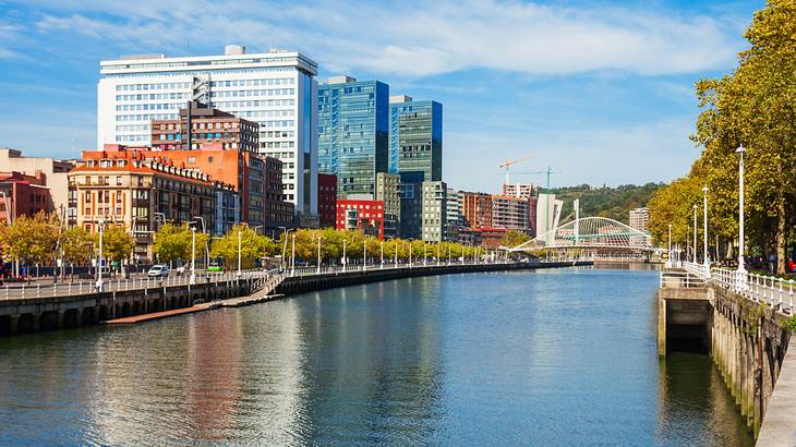 A river near skyscrapers and buildings