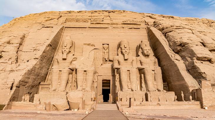 Pharaohs carved on the Abu Simbel Temples' entrance, a famous landmark in Egypt