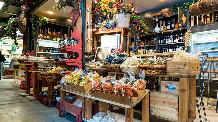 An indoor market with products in a small shop