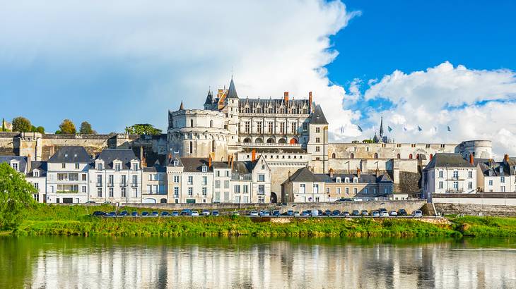 Castles near a body of water on a cloudy day