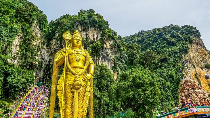 A gold statue at the Batu Caves, a must for a 3 day Kuala Lumpur itinerary