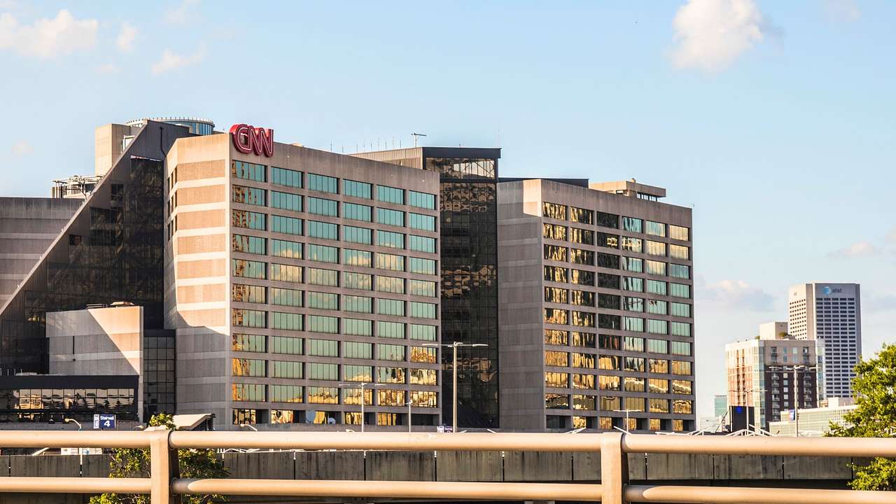 A building with many windows and a sign saying "CNN"