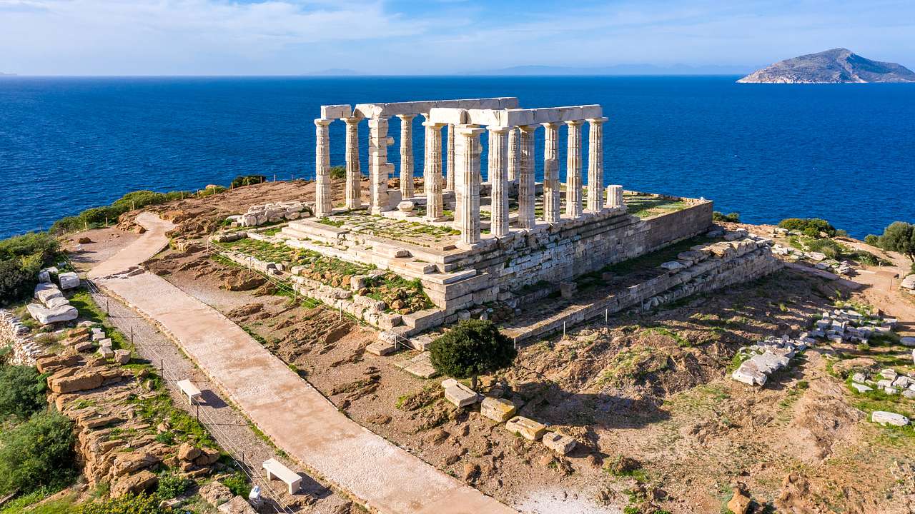 Temple of Poseidon overlooking the sea at Cape Sounion in Greece