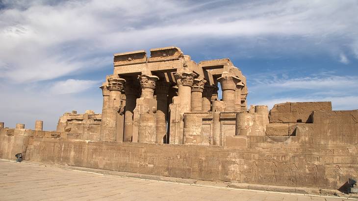 A unique double temple from Ancient Egypt on a partly cloudy day