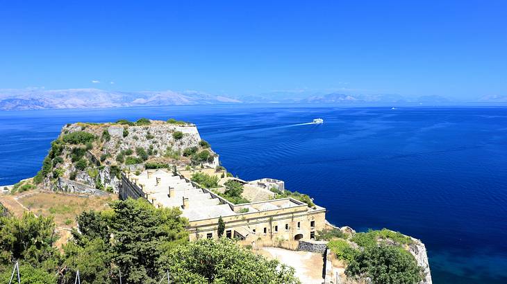 The old fortress on top of Corfu Island with the blue sea in the background, Greece