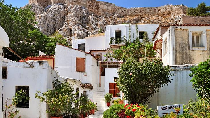 White houses on a hill in the neighbourhood of Plaka in Athens, Greece White houses on a hill in the neighbourhood of Plaka in Athens, Greece