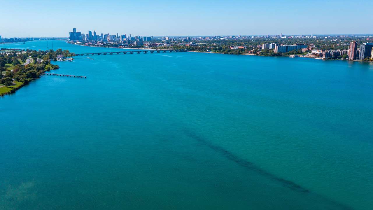 A large body of water near an urban city