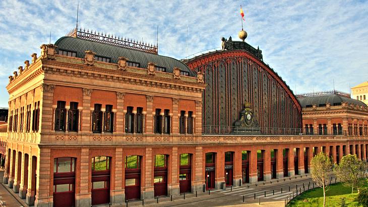 The entrance to Atocha Railway Station, one of the famous Spain landmarks